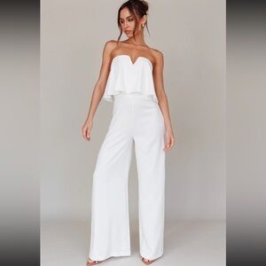 White strapless jumpsuit. Never worn, new with tags. Size small.